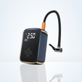 portable tire inflator air compressor for car tires
compact air pump for car emergency roadside use
rechargeable mini air compressor for car and bike
digital tire inflator showing PSI screen in use
inflating car tire with portable cordless air pump
multi-purpose portable air compressor for bike and car tires